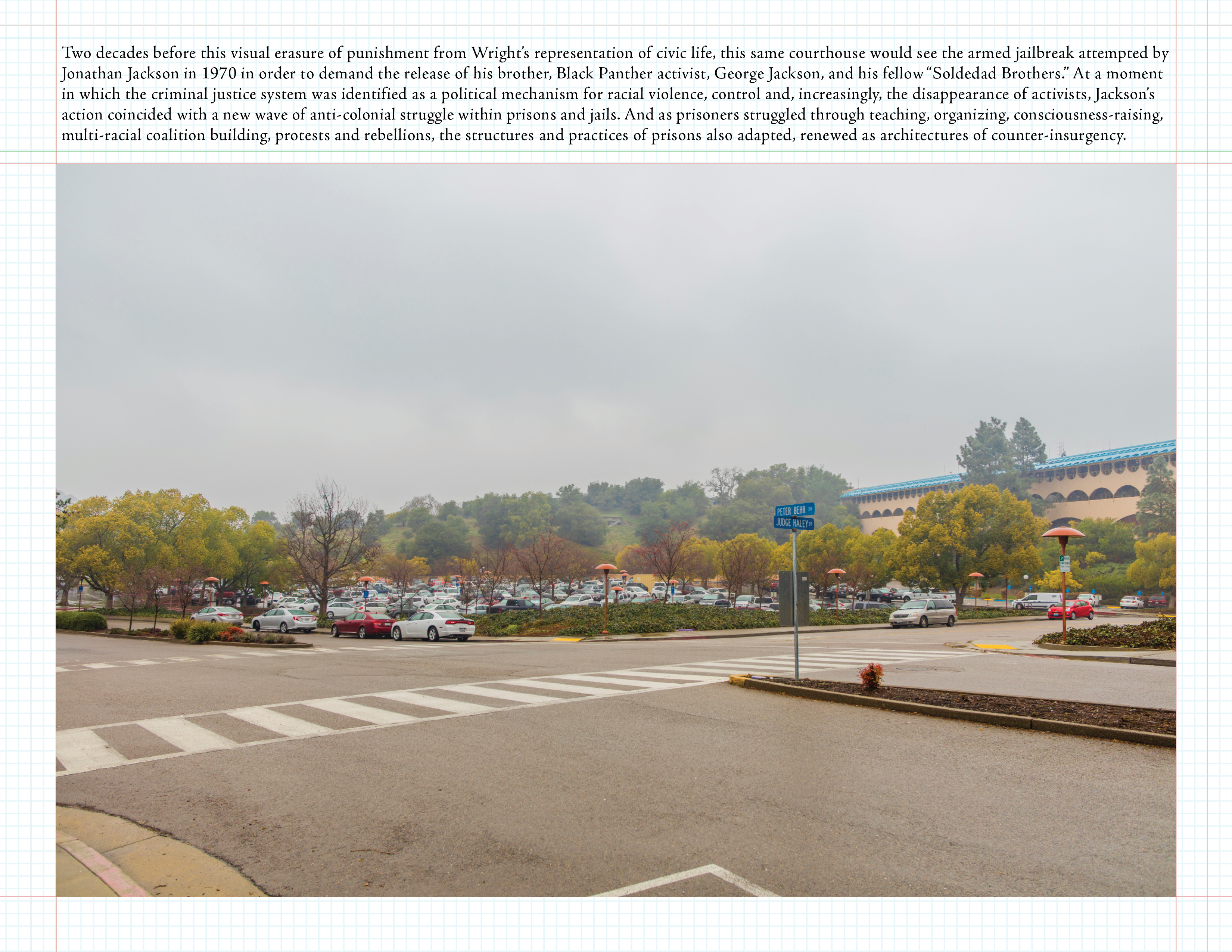 Image of a road intersection and parking lot.