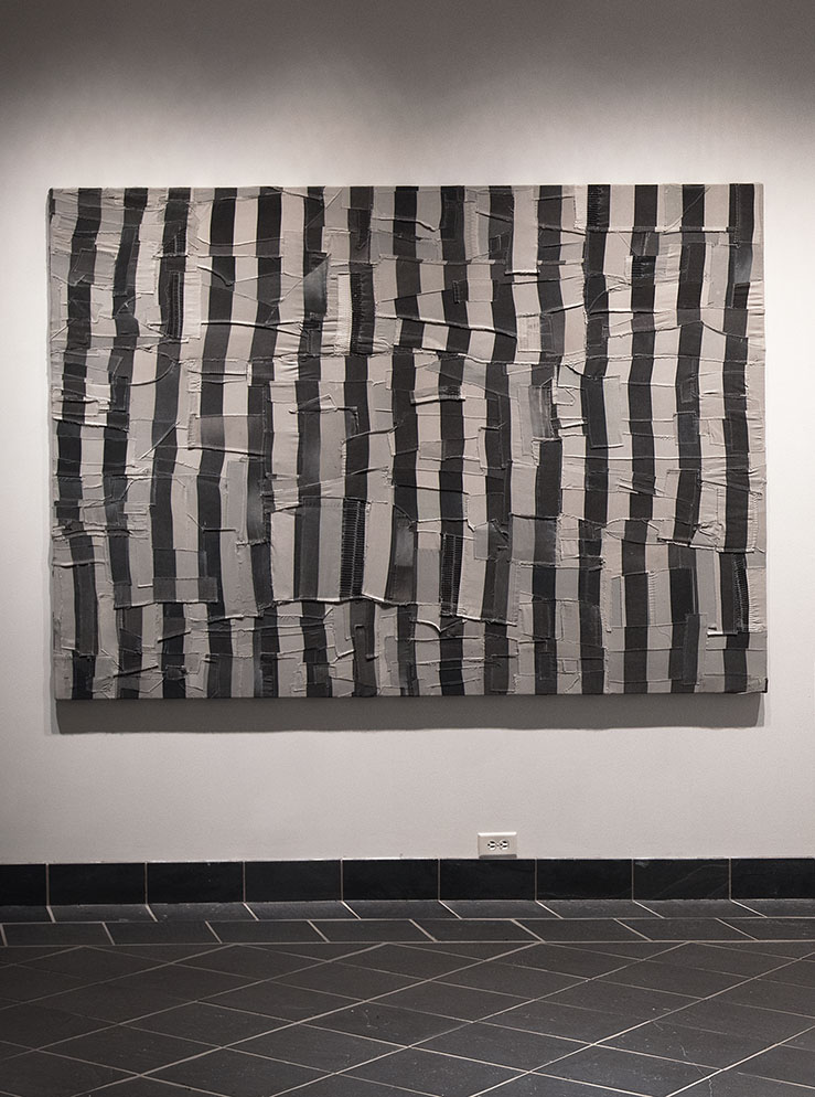 Image of a black and white striped quilt